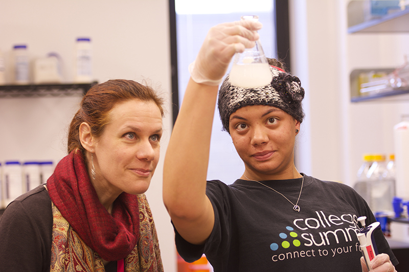 Dr. Hazel Barton and a student working with data